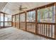 Cozy screened patio, ideal for enjoying nature views in this home at 404 Willow Way, Villa Rica, GA 30180