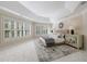 Bedroom features recessed lighting, custom shutters, neutral walls, and a tray ceiling at 460 Laurel Chase Ct, Atlanta, GA 30327