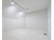 Well-lit bedroom with plush carpeting, and a door leading to other areas of the home at 460 Laurel Chase Ct, Atlanta, GA 30327