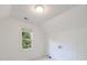 Bright bedroom features a window with natural light and a clean, minimalist aesthetic at 460 Laurel Chase Ct, Atlanta, GA 30327