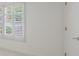 Bright bedroom with window and white shutters, offering lots of natural light at 460 Laurel Chase Ct, Atlanta, GA 30327