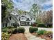 Elegant two-story home with a manicured front yard and a charming stone pathway at 460 Laurel Chase Ct, Atlanta, GA 30327
