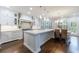 Gourmet kitchen featuring a large island, custom cabinetry, and a breakfast nook at 460 Laurel Chase Ct, Atlanta, GA 30327