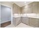 Kitchen features custom cabinets, marble countertops, modern fixtures, and under cabinet lighting at 460 Laurel Chase Ct, Atlanta, GA 30327