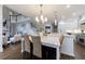 Spacious eat-in kitchen with stainless steel appliances, center island, and open floor plan at 460 Laurel Chase Ct, Atlanta, GA 30327