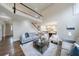 Open-concept living room flows seamlessly into the kitchen, creating a perfect space for entertaining at 460 Laurel Chase Ct, Atlanta, GA 30327