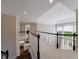 Loft area overlooking second story kitchen and backyard at 460 Laurel Chase Ct, Atlanta, GA 30327