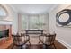 Inviting office with a fireplace, bay window, and stylish furnishings at 460 Laurel Chase Ct, Atlanta, GA 30327