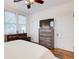 Bedroom features hardwood floors, bright windows, and a ceiling fan at 733 Frederica Ne St # 12, Atlanta, GA 30306