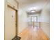 Hallway featuring hardwood floors, neutral walls, and a door with the number 12 at 733 Frederica Ne St # 12, Atlanta, GA 30306