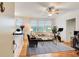 Bright living room with hardwood floors, large windows, comfortable seating, and modern décor at 733 Frederica Ne St # 12, Atlanta, GA 30306