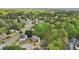 The home is nestled in a serene, tree-filled community with well-manicured lawns and picturesque views from above at 740 Trillium Ln, Lilburn, GA 30047