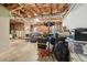 Unfinished basement with exposed ceiling, concrete floor, and boxes for storage at 740 Trillium Ln, Lilburn, GA 30047