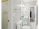 Bathroom with marble vanity, modern sink, and new light fixture at 740 Trillium Ln, Lilburn, GA 30047