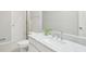 Bathroom with granite vanity, modern sink, and a large mirror at 740 Trillium Ln, Lilburn, GA 30047