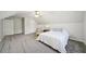 Spacious bedroom with neutral carpet, ceiling fan and a sitting area at 740 Trillium Ln, Lilburn, GA 30047
