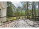 Spacious wooden deck with railings overlooking the backyard at 740 Trillium Ln, Lilburn, GA 30047
