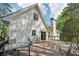 Spacious deck with seating area, perfect for outdoor entertaining with access to the kitchen at 740 Trillium Ln, Lilburn, GA 30047