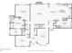 The home's first floor includes a primary bedroom, kitchen, living room, and dining room at 740 Trillium Ln, Lilburn, GA 30047