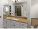 Main bath features a double sink vanity, soaking tub, and walk-in shower at 1643 Wade Ne Ave, Atlanta, GA 30317