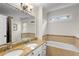 Main bath features a double sink vanity, soaking tub, and natural light at 1643 Wade Ne Ave, Atlanta, GA 30317
