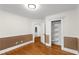 This bedroom features hardwood floors and access to the bathroom at 1643 Wade Ne Ave, Atlanta, GA 30317