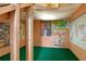 Fun bonus room with built in wood features, carpet, and lots of decor at 1643 Wade Ne Ave, Atlanta, GA 30317