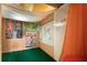 Fun bonus room with built in wood features, carpet, and lots of decor at 1643 Wade Ne Ave, Atlanta, GA 30317