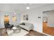 Bright sunroom with lots of natural light, hardwood floors and modern furnishings at 1643 Wade Ne Ave, Atlanta, GA 30317
