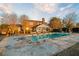 Beautiful home exterior featuring a spacious pool and inviting outdoor living space at 1909 Hickory Level Rd, Villa Rica, GA 30180
