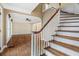 Welcoming foyer with hardwood floors and staircase, leading to a spacious interior at 1909 Hickory Level Rd, Villa Rica, GA 30180