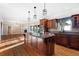Gourmet kitchen featuring a large island, custom cabinetry, and stainless steel appliances at 1909 Hickory Level Rd, Villa Rica, GA 30180