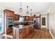 Modern kitchen with granite counters, stainless appliances, and ample cabinet space at 1909 Hickory Level Rd, Villa Rica, GA 30180