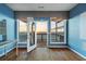 Spacious living room with hardwood floors leading to a balcony with stunning views at 1909 Hickory Level Rd, Villa Rica, GA 30180