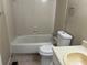 Bathroom with ceramic tile surround in the shower/tub combo at 2834 Royal Path Ct, Decatur, GA 30030