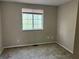 Bedroom with wall to wall carpeting and a large window at 2834 Royal Path Ct, Decatur, GA 30030