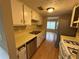 A full kitchen shows lots of cabinetry for storage and laminate countertops at 2834 Royal Path Ct, Decatur, GA 30030