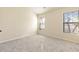 Bedroom with neutral carpet, large windows, and ample natural light at 2930 Smith Ridge Trce, Peachtree Corners, GA 30071