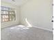 Bright bedroom with a neutral carpet, large window, and ample natural light at 2930 Smith Ridge Trce, Peachtree Corners, GA 30071