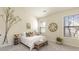 Bright bedroom featuring large windows, a cozy bed, and stylish decor for a relaxing atmosphere at 2930 Smith Ridge Trce, Peachtree Corners, GA 30071