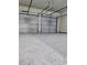 Spacious two car garage with epoxy floor for parking and storage at 2930 Smith Ridge Trce, Peachtree Corners, GA 30071