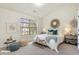 Staged bedroom featuring a bed, decorations, and ample natural light at 2930 Smith Ridge Trce, Peachtree Corners, GA 30071