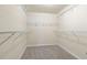 Spacious walk-in closet with carpet and metal shelving at 2930 Smith Ridge Trce, Peachtree Corners, GA 30071