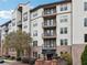 Beautiful Serrano building with well-maintained landscaping at 901 Abernathy Ne Rd # 3200, Atlanta, GA 30328