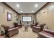 Private home theater featuring leather recliners, sconces, and a large projection screen for movie nights at 901 Abernathy Ne Rd # 3200, Atlanta, GA 30328