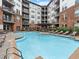 Community pool with plenty of room to lounge at 901 Abernathy Ne Rd # 3200, Atlanta, GA 30328