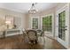 Breakfast nook with a table and chairs; bright with lots of natural light at 3100 Templeton Ln, Loganville, GA 30052