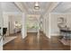 Open foyer showcasing hardwood floors and access to the living spaces at 3100 Templeton Ln, Loganville, GA 30052