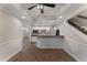 Finished basement with kitchenette, breakfast bar, and stairs to the upper level at 3100 Templeton Ln, Loganville, GA 30052
