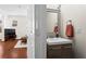 Stylish powder room featuring a floating vanity, square sink, and modern fixtures, blending into the living area at 2855 Peachtree Ne Rd # 115, Atlanta, GA 30305